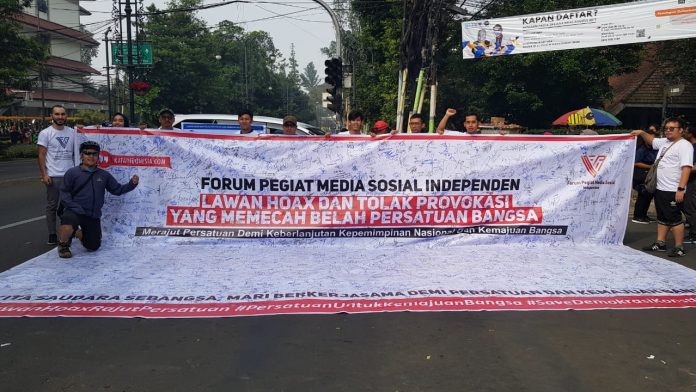 FPMSI saat menggelar Aksi Lawan Hoax di Medsos, Minggu (23/6/2019).